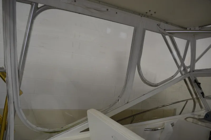 Slide: The Image of 2004 Carolina Classic 28 boat interior frame structure, showcasing metal framework and design details. - 20