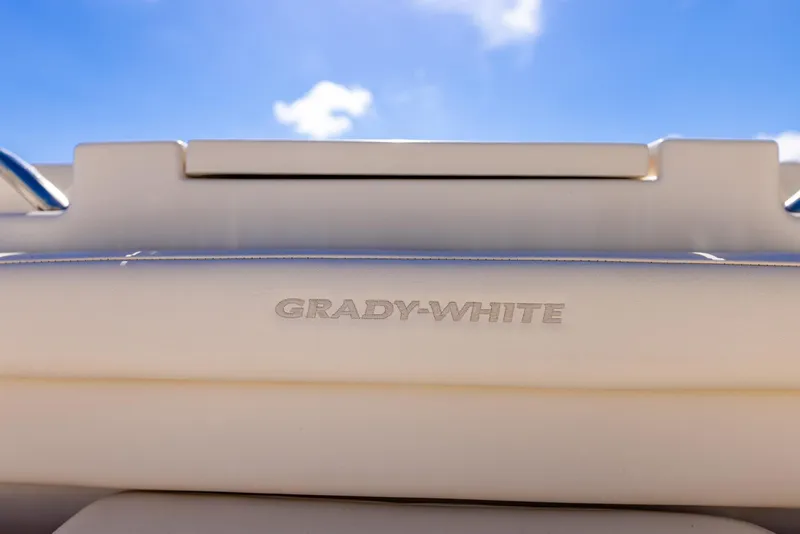 Slide: The Image of 2022 Grady-White Canyon 336 boat detail against blue sky. - 20