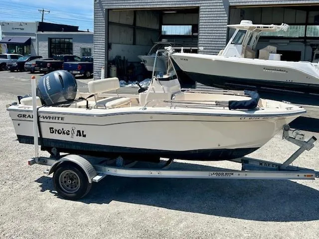 Slide: The Image of 2020 Grady-White Fisherman 180 boat on trailer in outdoor setting. - 0