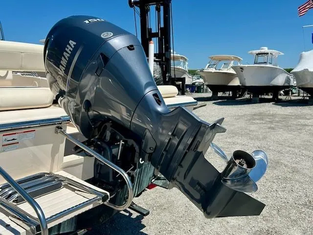 Slide: The Image of 2020 Grady-White Fisherman 180 with Yamaha outboard motor in a boatyard. - 17