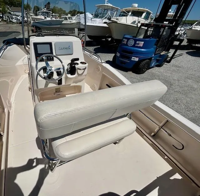 Slide: The Image of 2020 Grady-White Fisherman 180 boat interior with Garmin navigation system and seating. - 4