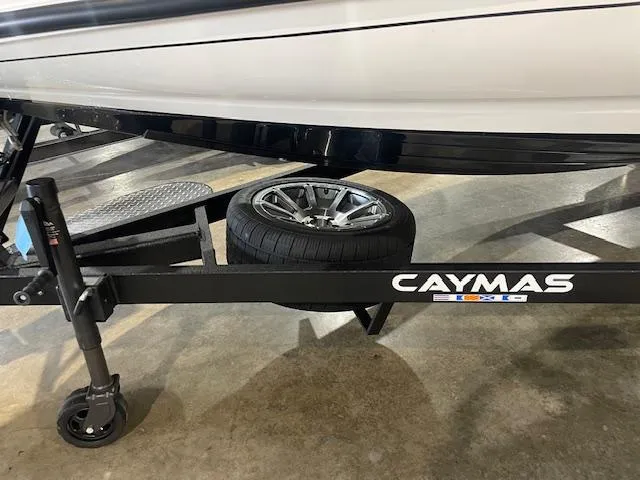 Slide: The Image of 2025 Caymas CX21Pro boat trailer with spare tire on display. - 5