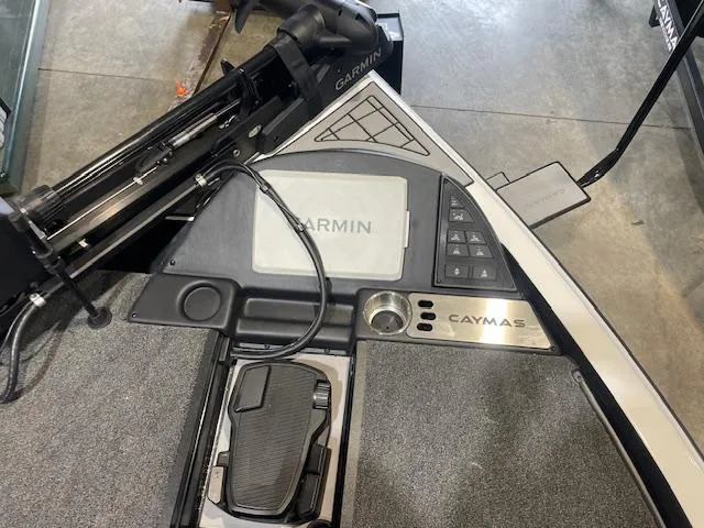 Slide: The Image of 2025 Caymas CX21Pro boat dashboard with Garmin electronics and foot pedal. - 8