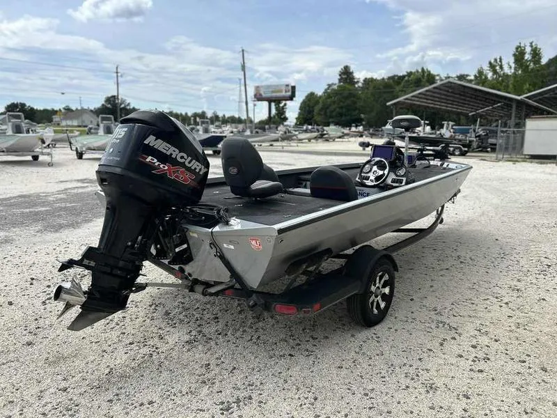 Slide: The Image of 2016 Ranger RT188 boat with Mercury Pro XS engine in a gravel lot. - 3