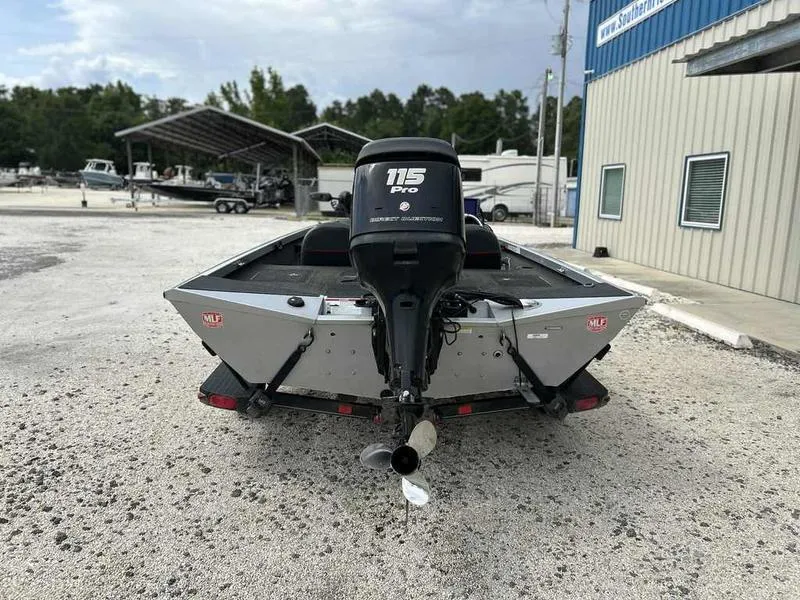 Slide: The Image of 2016 Ranger RT188 boat with 115 Pro outboard motor, parked outdoors. - 7