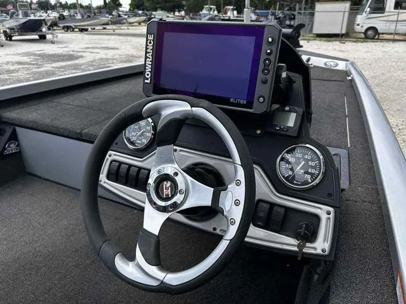 Slide: The Image of 2016 Ranger RT188 boat dashboard with Lowrance Elite fishfinder and steering wheel. - 8
