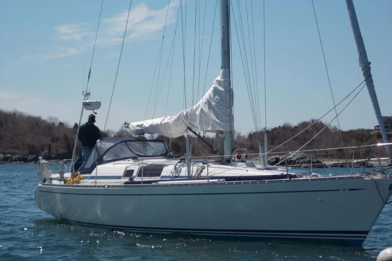 Slide: The Image of Sailing yacht Nautor Swan 44, 1992 model, cruising on calm waters. - 7