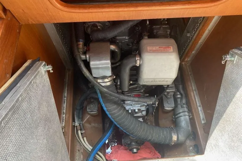 Slide: The Image of Engine compartment of a 1992 Nautor Swan 44 sailboat, showcasing mechanical components. - 9