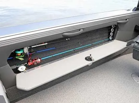 Slide: The Image of Interior of 2026 Lund 1975 Tyee boat showing storage compartment and seating. - 11