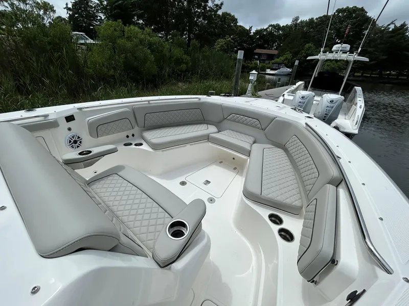 Slide: The Image of Luxurious seating area on a 2026 Pursuit S 328 boat, featuring elegant upholstery. - 24