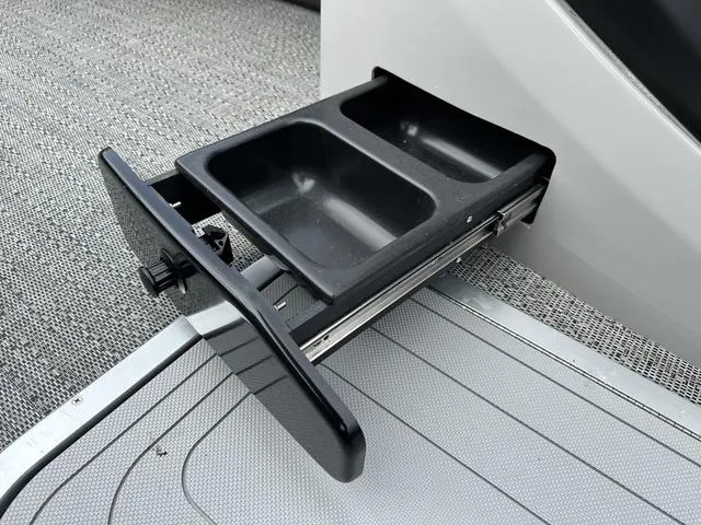Slide: The Image of Cup holder on 2025 Barletta Boats C20UC, featuring a sleek, retractable design. - 10