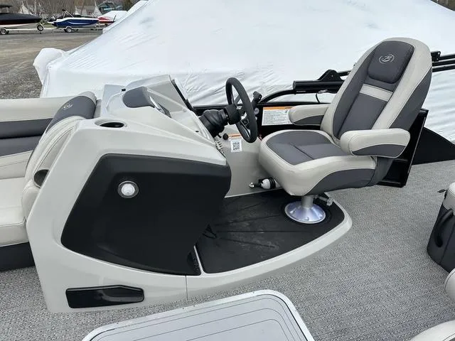 Slide: The Image of 2025 Barletta Boats C20UC helm with modern seating and controls. - 29