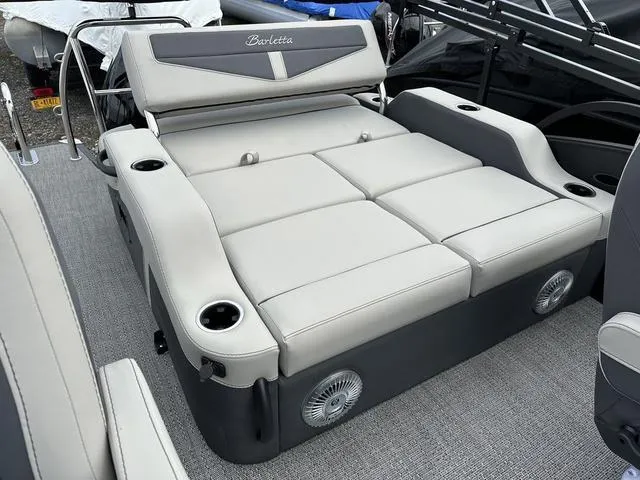 Slide: The Image of 2025 Barletta C20UC boat with luxurious seating and cup holders. - 33