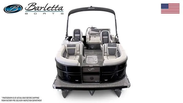 Slide: The Image of 2025 Barletta C20UC pontoon boat, sleek design, spacious seating, black and gray color scheme. - 45