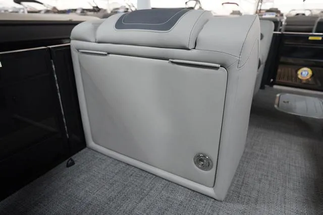 Slide: The Image of 2025 Barletta Corsa 23UC boat interior, featuring sleek gray seating and modern design elements. - 15