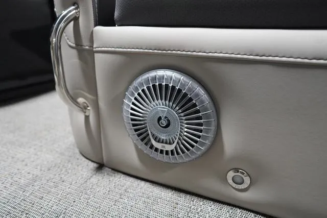 Slide: The Image of 2025 Barletta Corsa 23UC boat seat with integrated speaker and control button. - 27