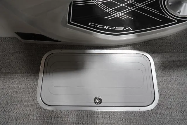 Slide: The Image of 2025 Barletta Corsa 23UC boat floor detail with sleek design and storage compartment. - 34