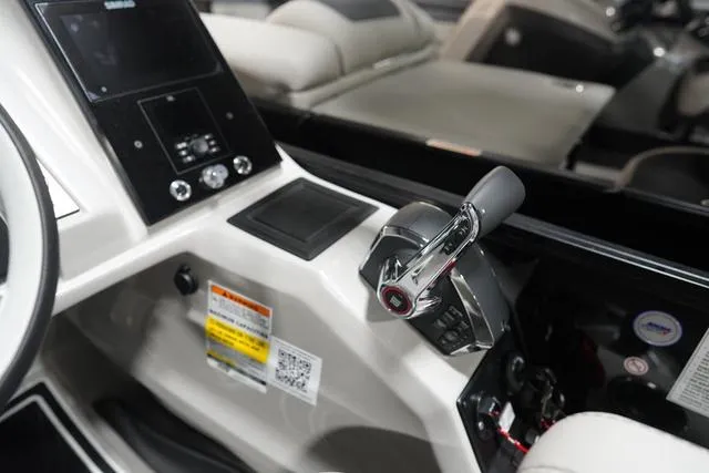 Slide: The Image of 2025 Barletta Corsa 23UC boat dashboard with modern controls and sleek design. - 39