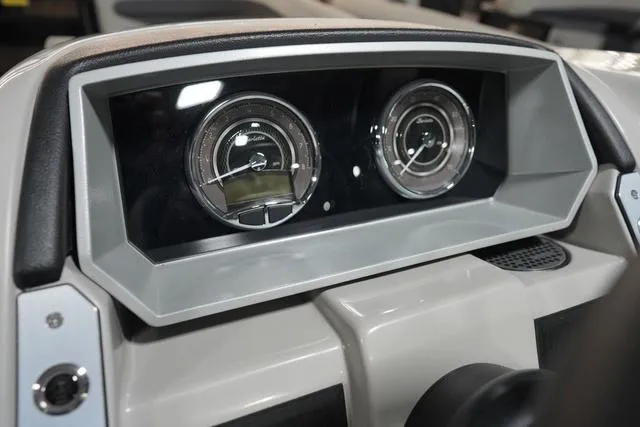 Slide: The Image of Dashboard of 2025 Barletta Corsa 23UC boat with dual circular gauges. - 41