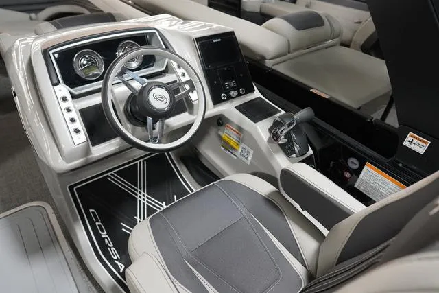 Slide: The Image of 2025 Barletta Corsa 23UC boat cockpit with modern steering and control panel. - 45