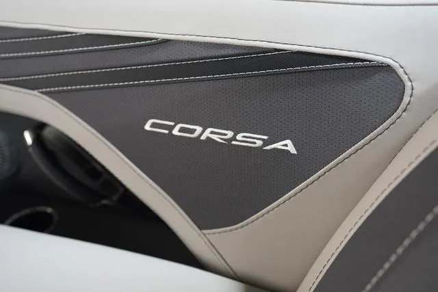 Slide: The Image of 2025 Barletta Corsa 23UC boat interior with sleek design and "Corsa" branding. - 9