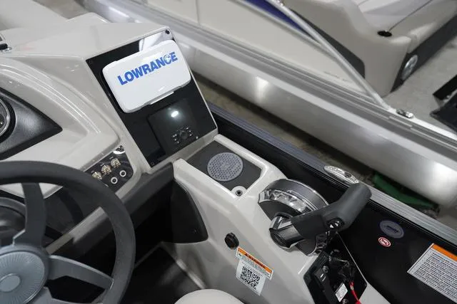 Slide: The Image of Control panel of 2025 Barletta Boats C22QC with Lowrance navigation system. - 12