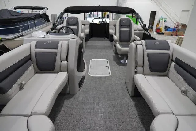 Slide: The Image of 2025 Barletta Boats C22QC interior with luxurious seating and modern design. - 14