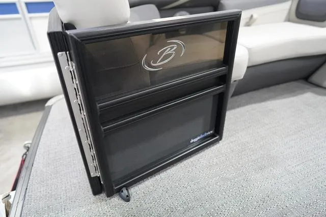 Slide: The Image of 2025 Barletta Boats C22QC interior detail with logo, showcasing luxury seating and design. - 21