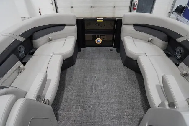 Slide: The Image of 2025 Barletta Boats C22QC interior with plush seating and modern design. - 25