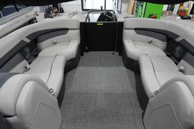 Slide: The Image of 2025 Barletta Boats C22QC interior with spacious seating and modern design. - 32