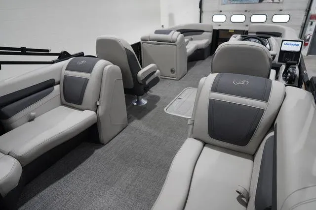 Slide: The Image of 2025 Barletta Boats C22QC interior with plush seating and modern design. - 39