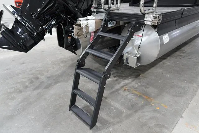 Slide: The Image of 2025 Barletta Boats C22QC with foldable boarding ladder and outboard motor. - 40