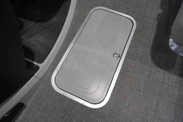 Slide: The Image of 2025 Barletta Boats C22QC floor hatch on textured surface. - 41