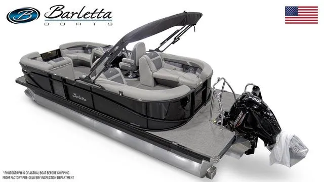 Slide: The Image of 2025 Barletta Boats C22QC pontoon with sleek design and powerful outboard motor. - 47