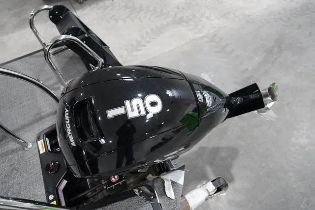 Slide: The Image of Outboard motor on 2025 Barletta Boats C22QC, featuring a Mercury 150 engine. - 6