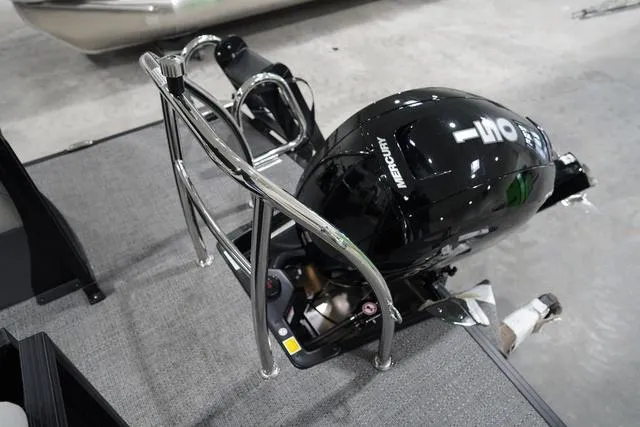 Slide: The Image of 2025 Barletta Boats C22QC with Mercury outboard motor on display. - 7