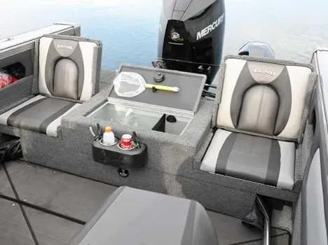 Slide: The Image of 2026 Lund 1975 Tyee boat interior with windshield and storage compartment. - 10