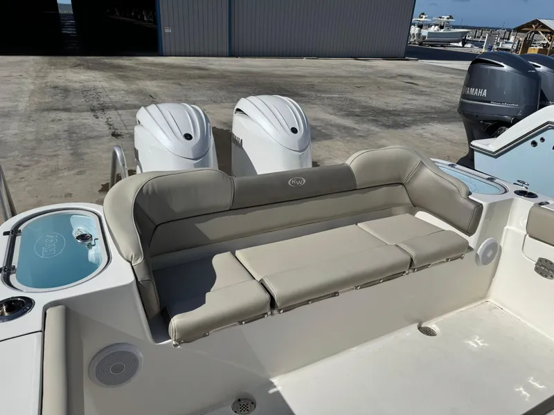 Slide: The Image of 2024 Key West 263 FS boat with dual engines and comfortable seating. - 10