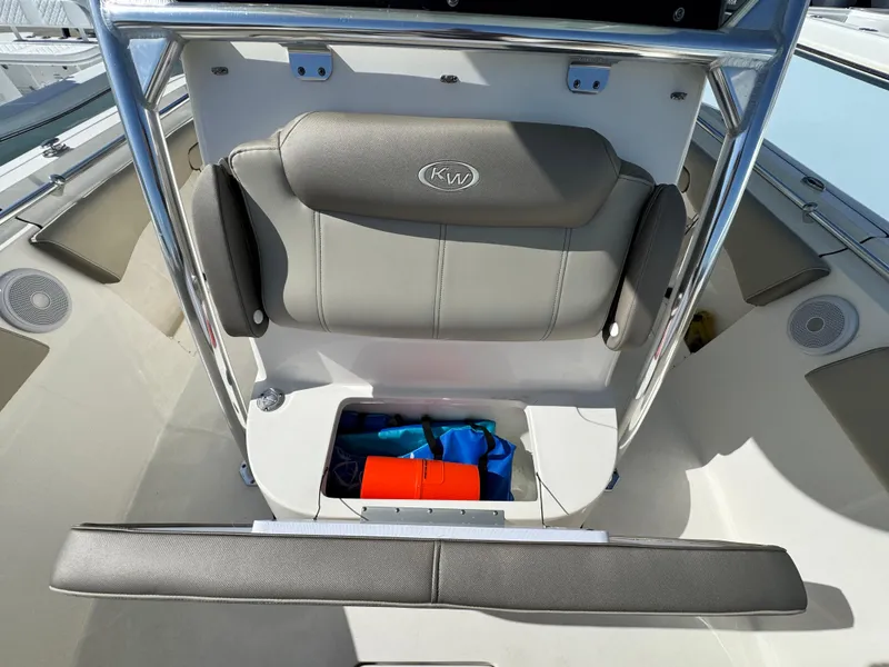 Slide: The Image of 2024 Key West 263 FS boat interior with storage compartment and seating. - 27