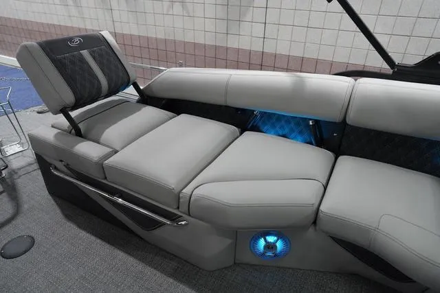 Slide: The Image of Luxurious seating on 2025 Barletta Boats L23M with ambient blue lighting. - 13
