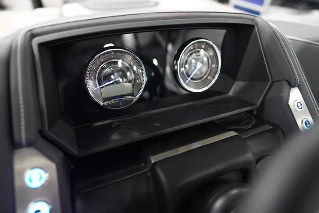 Slide: The Image of Dashboard of 2025 Barletta Boats L23M with modern gauges and controls. - 18