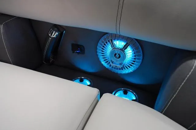 Slide: The Image of 2025 Barletta L23M boat interior with blue LED lighting and modern speaker system. - 23