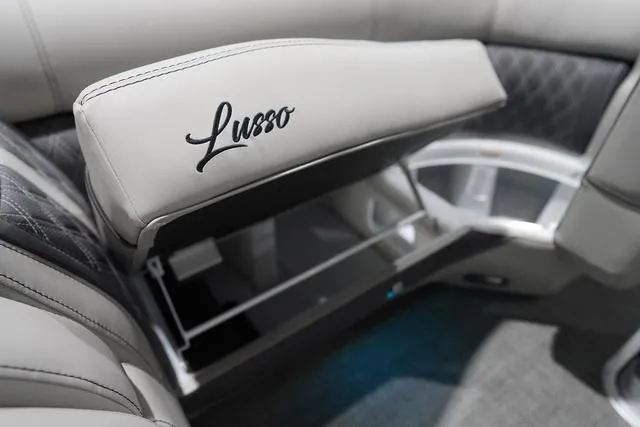 Slide: The Image of Luxurious seating in 2025 Barletta Boats L23M with storage compartment. - 24