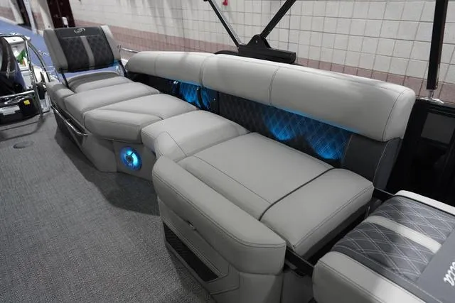 Slide: The Image of Luxurious seating on 2025 Barletta Boats L23M with ambient lighting and modern design. - 32