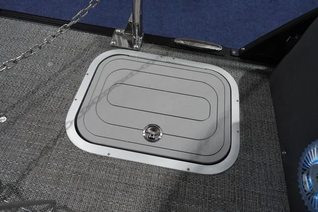 Slide: The Image of Hatch on 2025 Barletta Boats L23M deck, featuring textured flooring. - 36