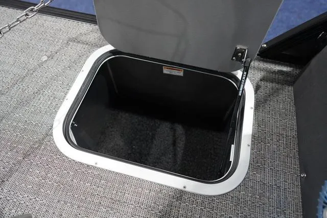 Slide: The Image of Open storage compartment on 2025 Barletta Boats L23M pontoon boat. - 37