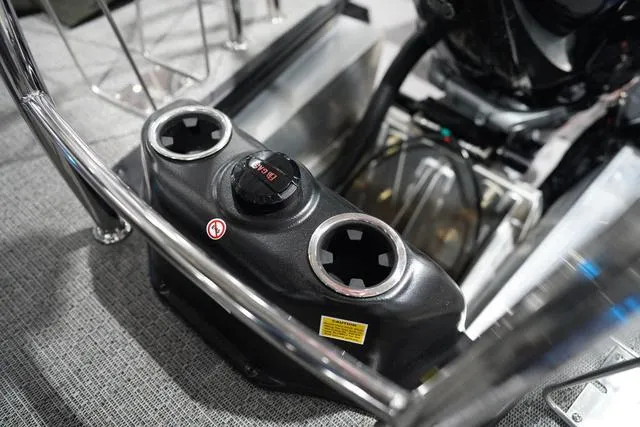 Slide: The Image of 2025 Barletta Boats L23M cup holders and control panel on a sleek, modern deck. - 38