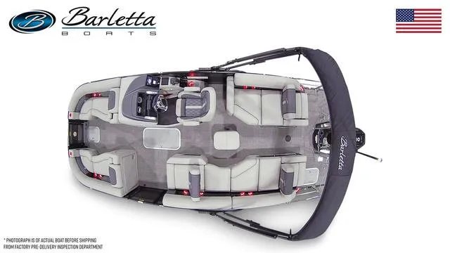 Slide: The Image of 2025 Barletta Boats L23M pontoon, top view, spacious seating, sleek design, American flag. - 48