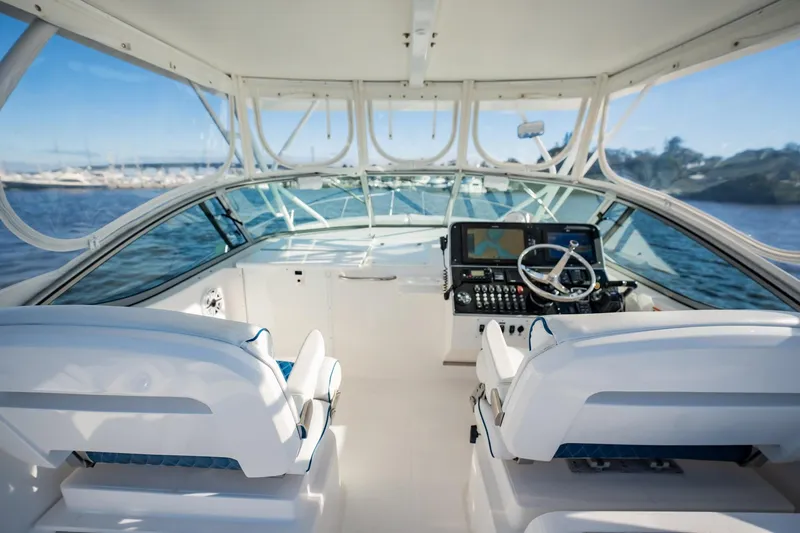 Slide: The Image of 2015 Stamas 390 Aegean boat interior with helm, steering wheel, and navigation equipment. - 8