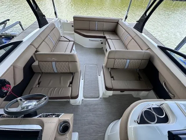 Slide: The Image of 2016 Sea Ray 270 Sundeck interior with spacious seating and modern design. - 18